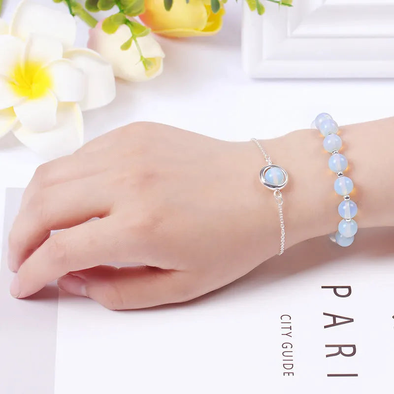 Double-layer women's bracelet with crystal beads and lucky charms in gold electroplated finish