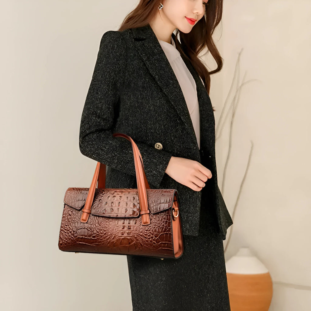 Soft leather messenger bag in horizontal square design with single shoulder strap