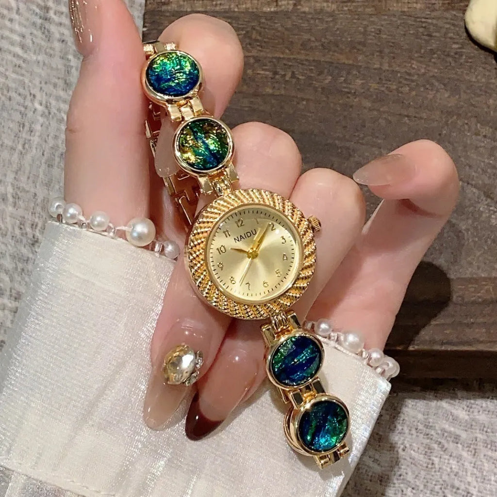 Women's quartz watch with 25mm round dial and zinc alloy case in six colour options