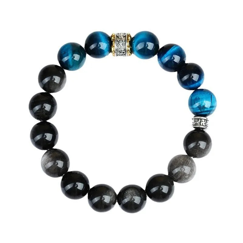 Peacock blue Tigereye stone bracelet with geometric ethnic design on wrist