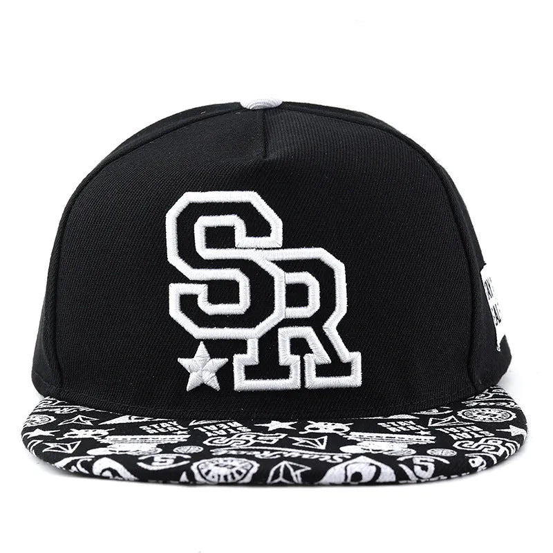Adjustable black cotton baseball cap with embroidered lettering on the front, showing dome crown shape.