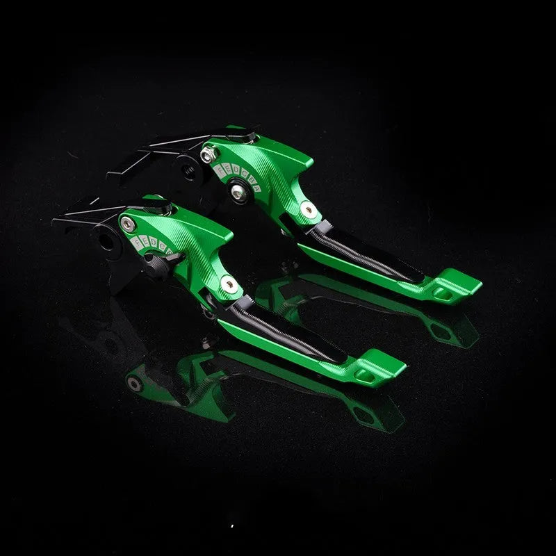 Pair of adjustable metal motorcycle brake and clutch levers in a selected colour on a handlebar.