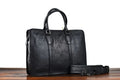 Men's brown leather business handbag with horizontal square design and zipper opening