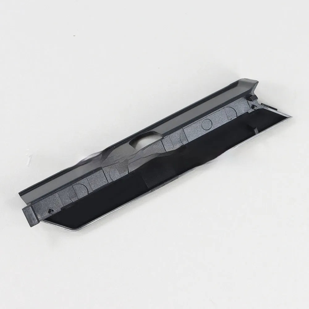 Black and white plastic hard drive cover for computer component organisation and protection