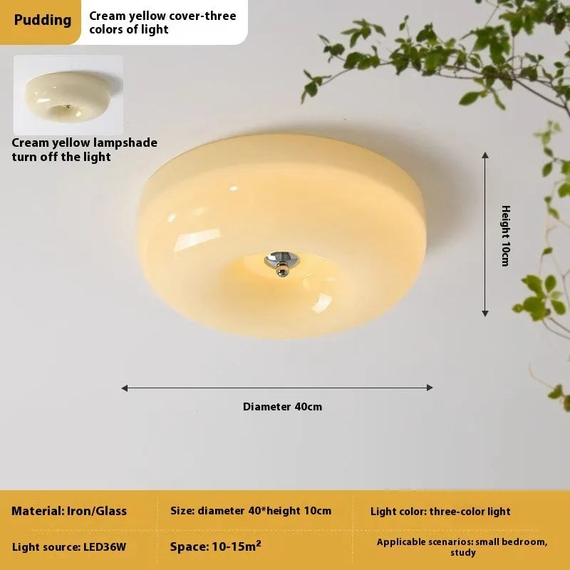 American style cream coloured bedroom ceiling lamp with three-colour light fitting on a white ceiling.