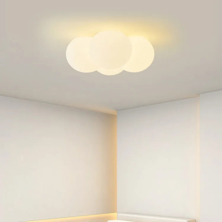 Modern cloud-shaped chandelier with 4 lights and minimalist design for bedroom ceiling mounting