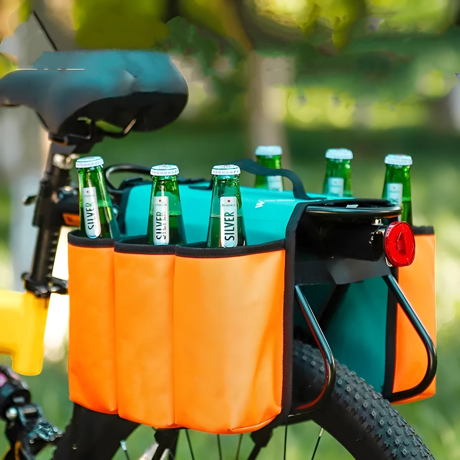 Black and blue orange double-sided bicycle handlebar drink storage bag mounted on bike.