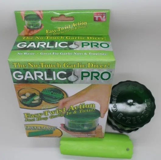Green transparent garlic peeler kitchen gadget measuring 8.5cm by 8.5cm by 6cm