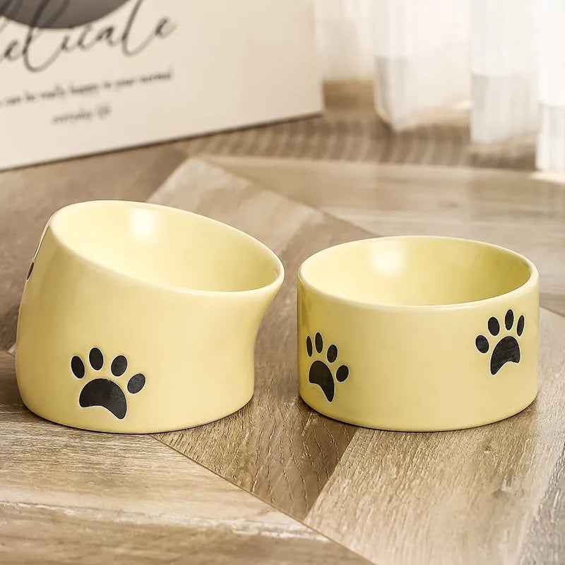 Ceramic cat bowl with high-footed design showing cat's paw decoration pattern in selected colour
