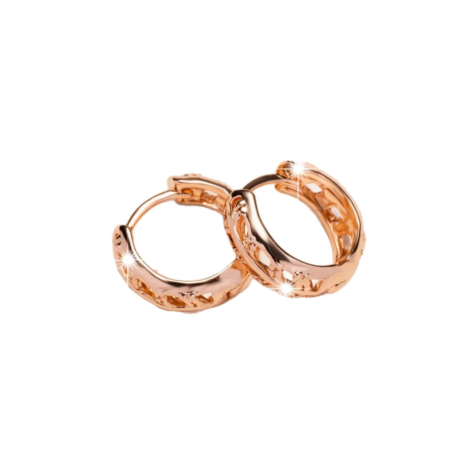 Rose gold plated copper earrings with hollowed-out heart and leaf shapes on a white background.