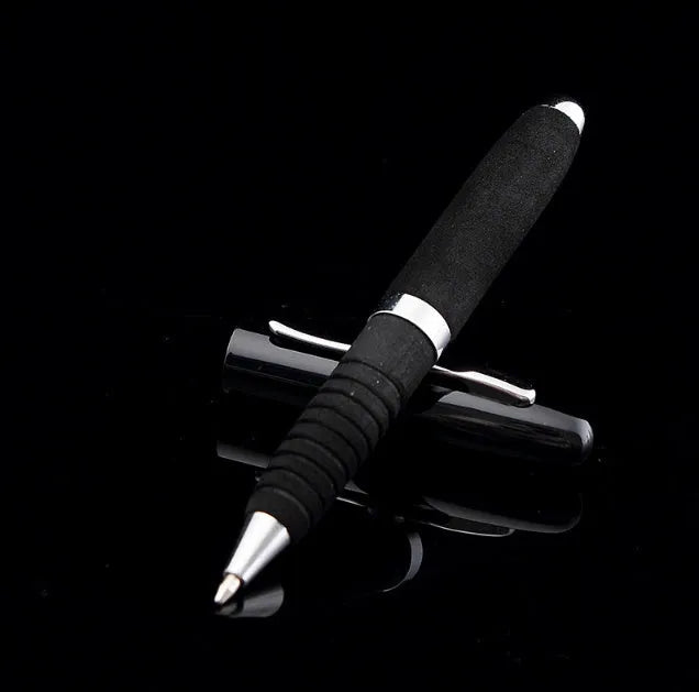 Compact silver metal ballpoint pen with black EVA-textured cap, shown with 1.0mm tip and assorted ink refills.
