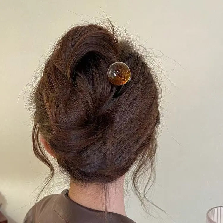 U-shaped acrylic hair barrettes with ball retro design in beige, caramel, dark gray and green colours