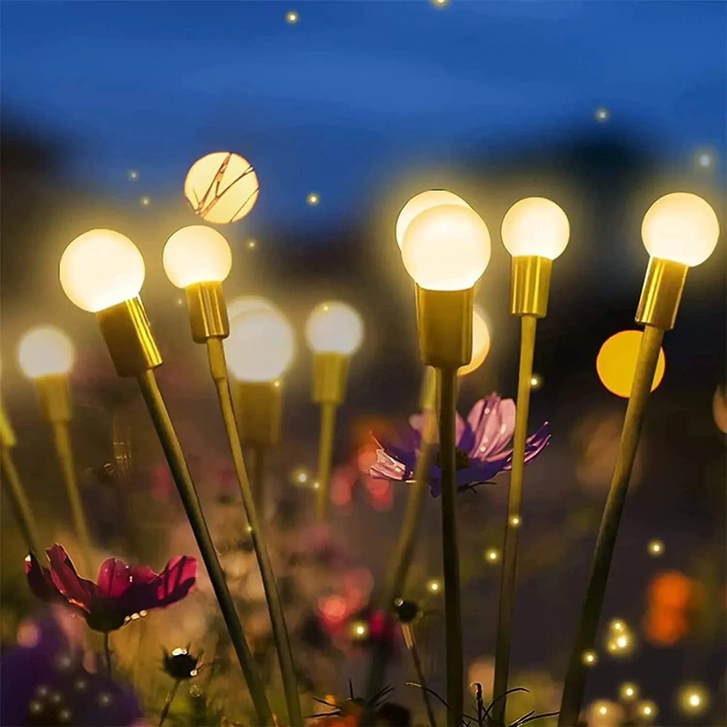 Solar-powered LED garden spike light with multiple glowing heads and a metal ground plug inserted in soil at dusk.