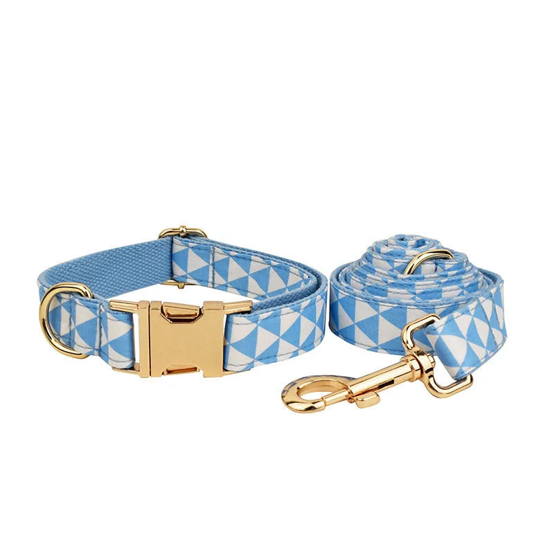 Blue cloth dog collar, leash, decorative bow, and vest set for small to medium dogs