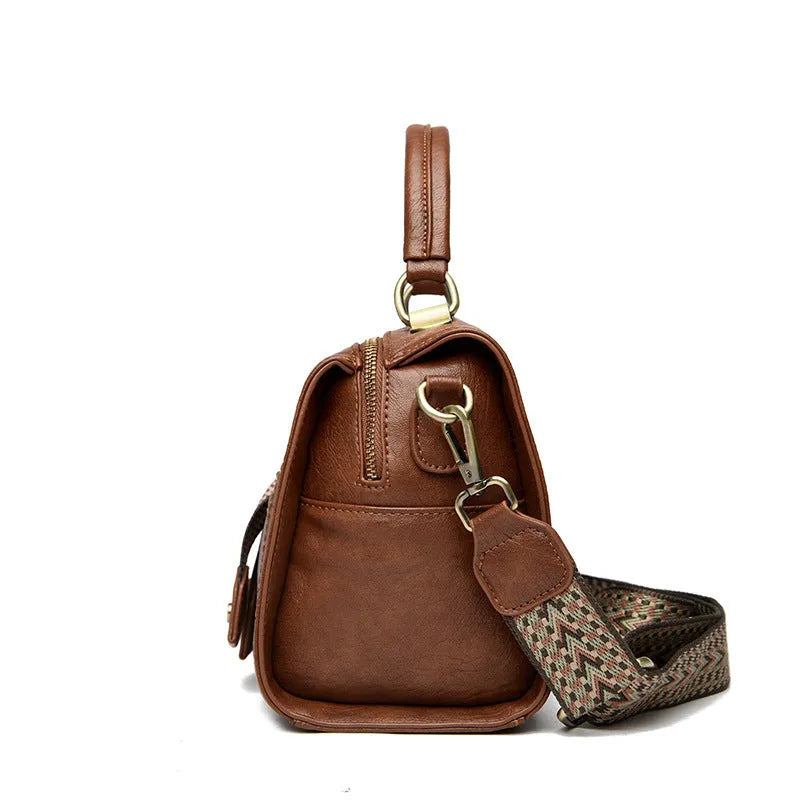 Women's retro style crossbody bag in six colour options with sandwich pocket design
