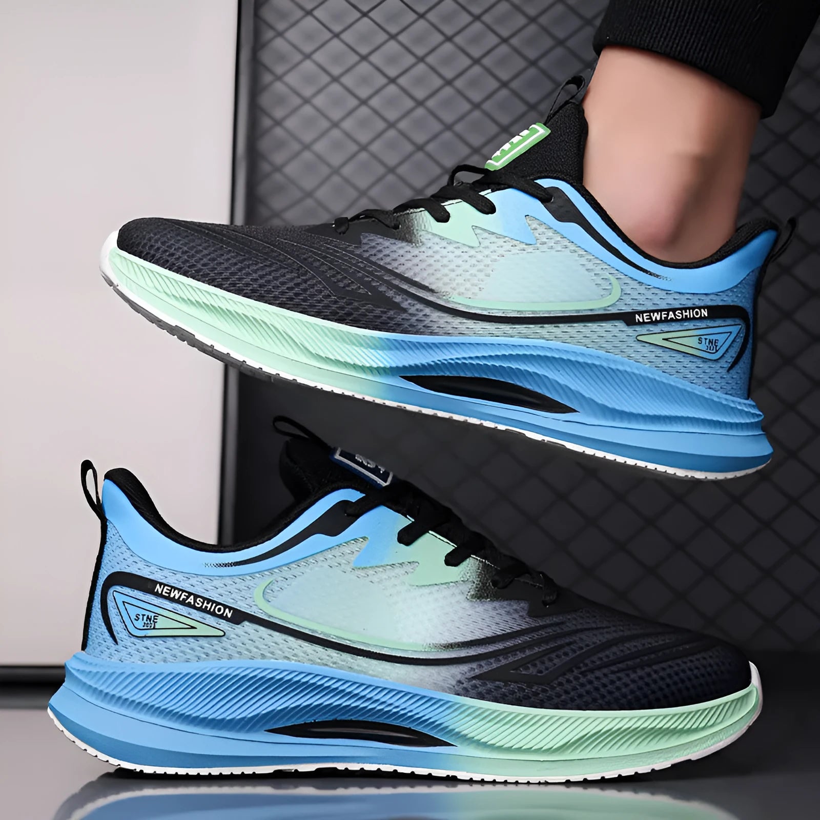 Men's low-top casual shoes in a gray green colour with a woven mesh upper and rubber sole.
