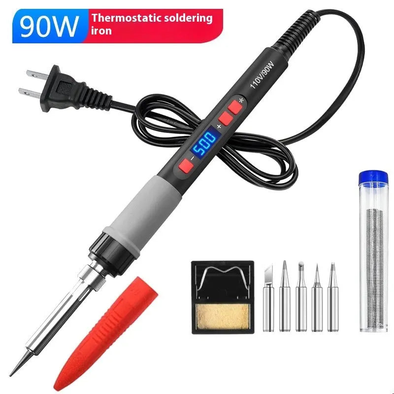 Grey electric soldering iron with ceramic heating core and accessories for household welding