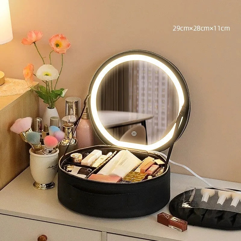 Round black smart LED makeup bag with lighted mirror open, showing internal partitions.