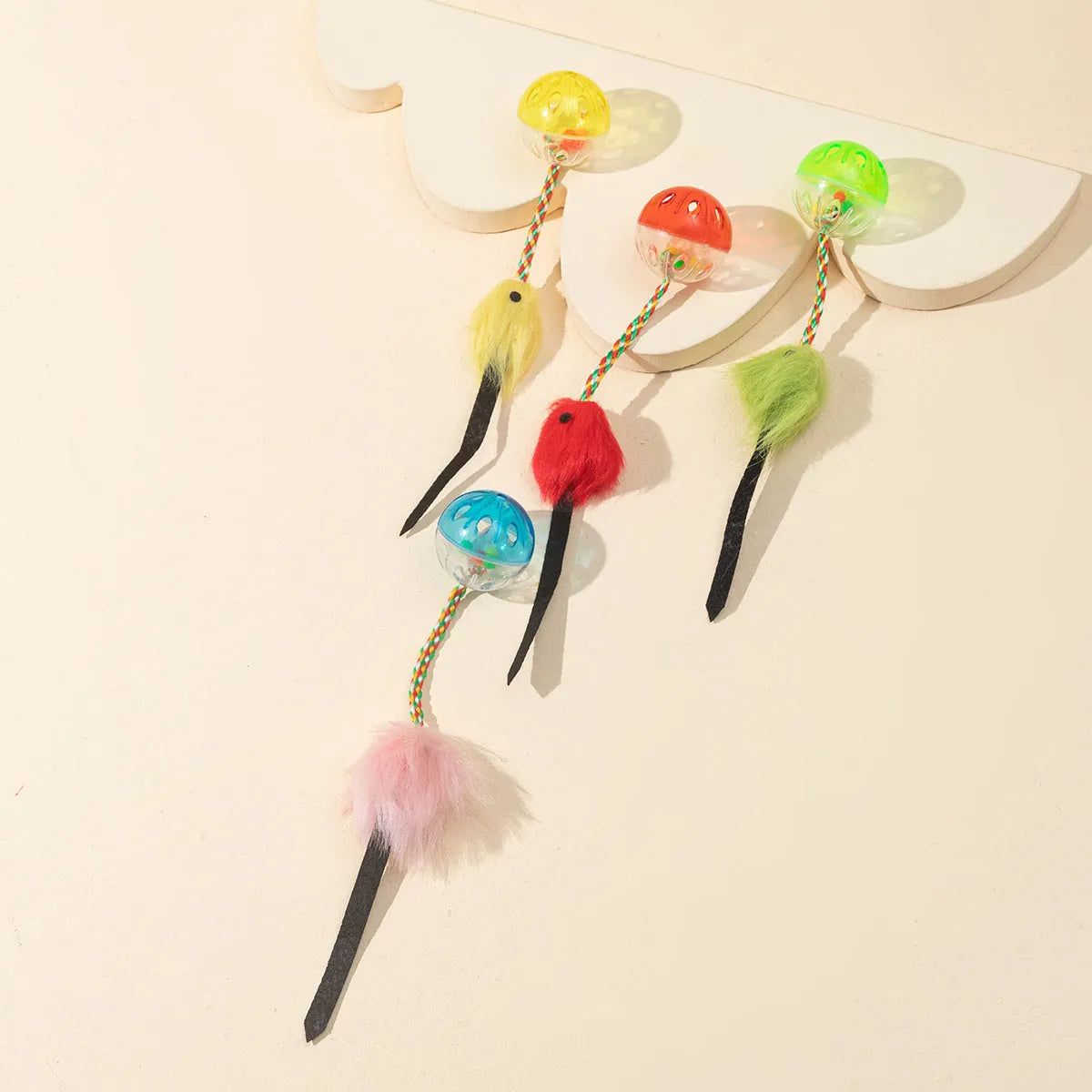 Colored plastic bell mesh hollow sound cat teasing ball in rainbow colour