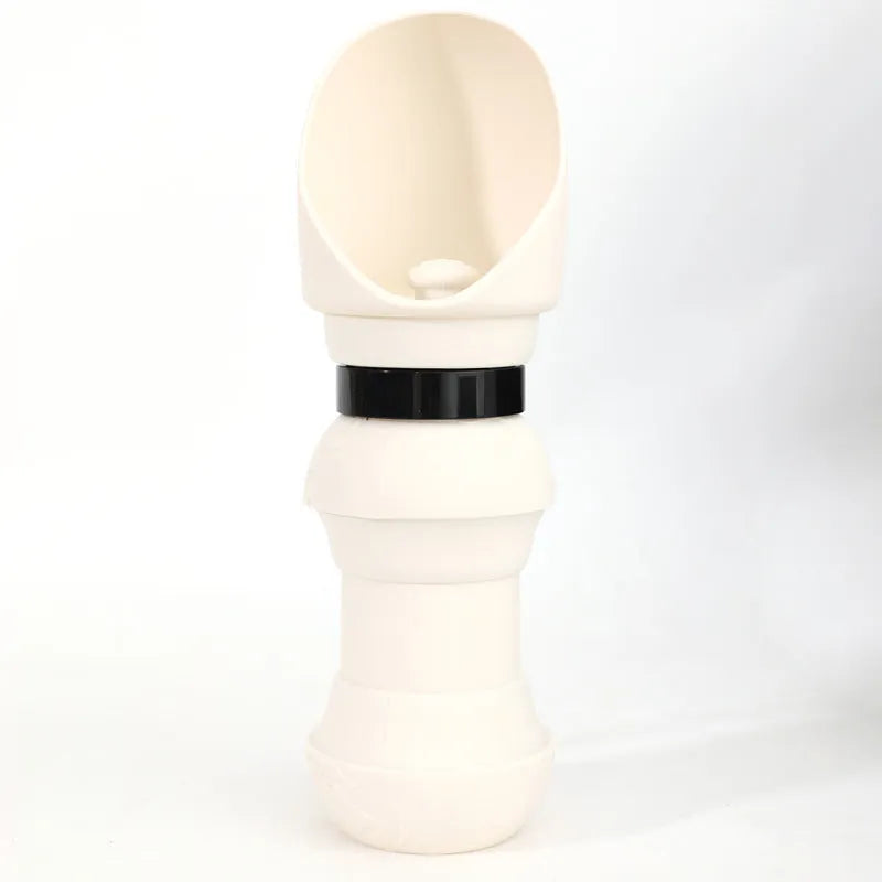 Silicone pet folding cup shown in assorted colours including black, pink, and blue, collapsed flat and expanded for use.