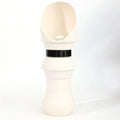 Silicone pet folding cup shown in assorted colours including black, pink, and blue, collapsed flat and expanded for use.