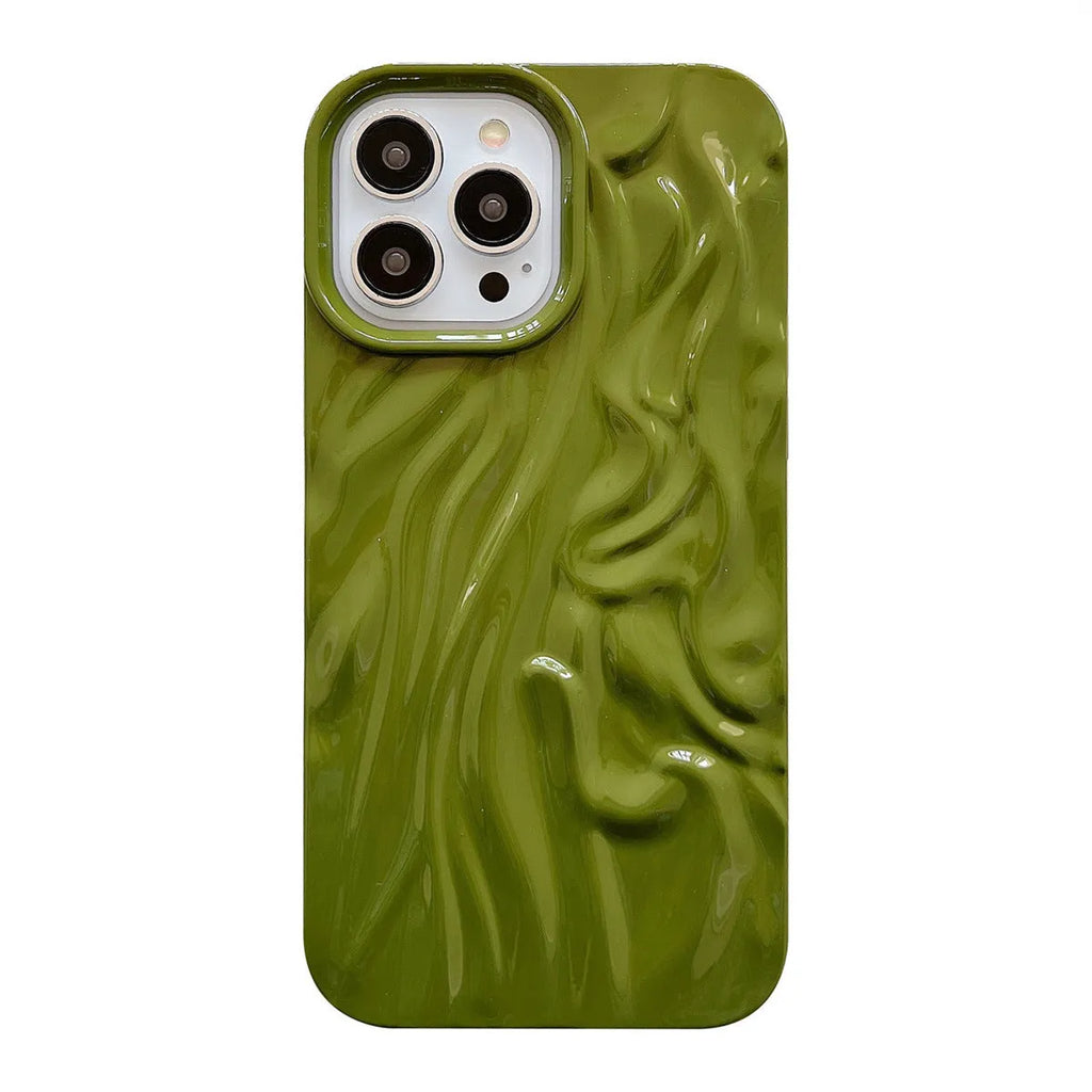 Milky white silicone iPhone case with a water ripple texture on a table.