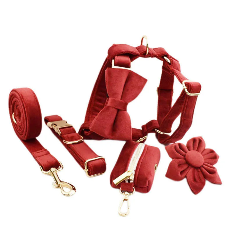 Soft cloth dog collar and leash set with matching vest, red bow tie, and included poop bag on a white background.