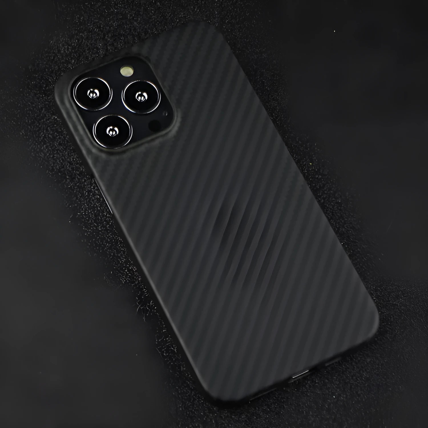 Dull Black Kevlar fibre iPhone case with Magsafe magnet for models 14, 13, 12, 11, and X.