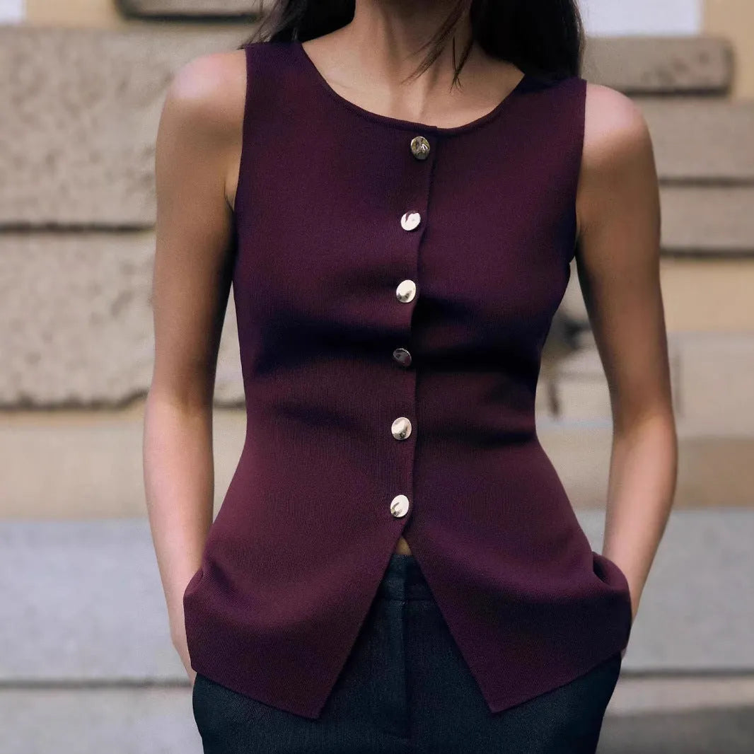 Dark red slim-fit sweater vest with gold buttons and 3D patterning on mannequin