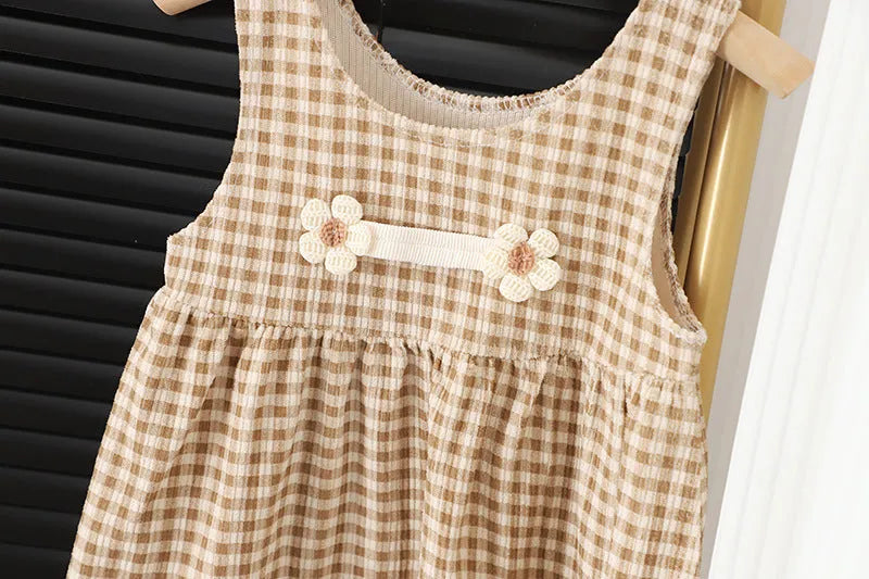 Baby girl wearing a dark coffee plaid Korean style long-sleeved dress suit with shirt.