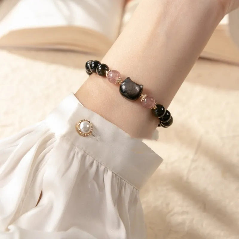 Black 8mm natural obsidian bead bracelet with silver kitty charm on elastic band