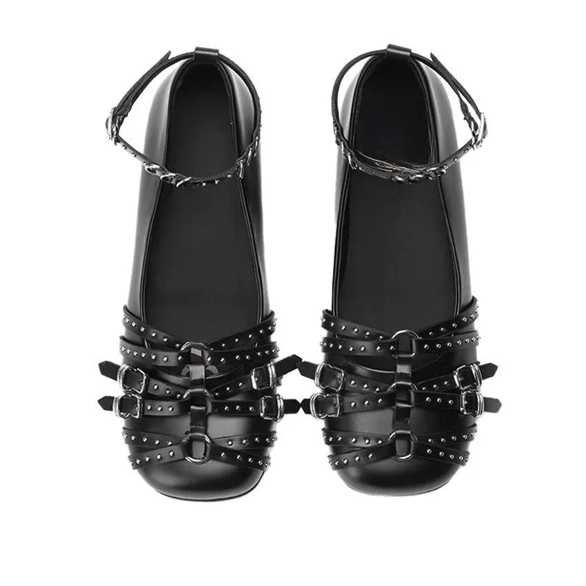 Women's black genuine leather retro buckle pumps with flat heel, square toe, and metal rivet decoration.