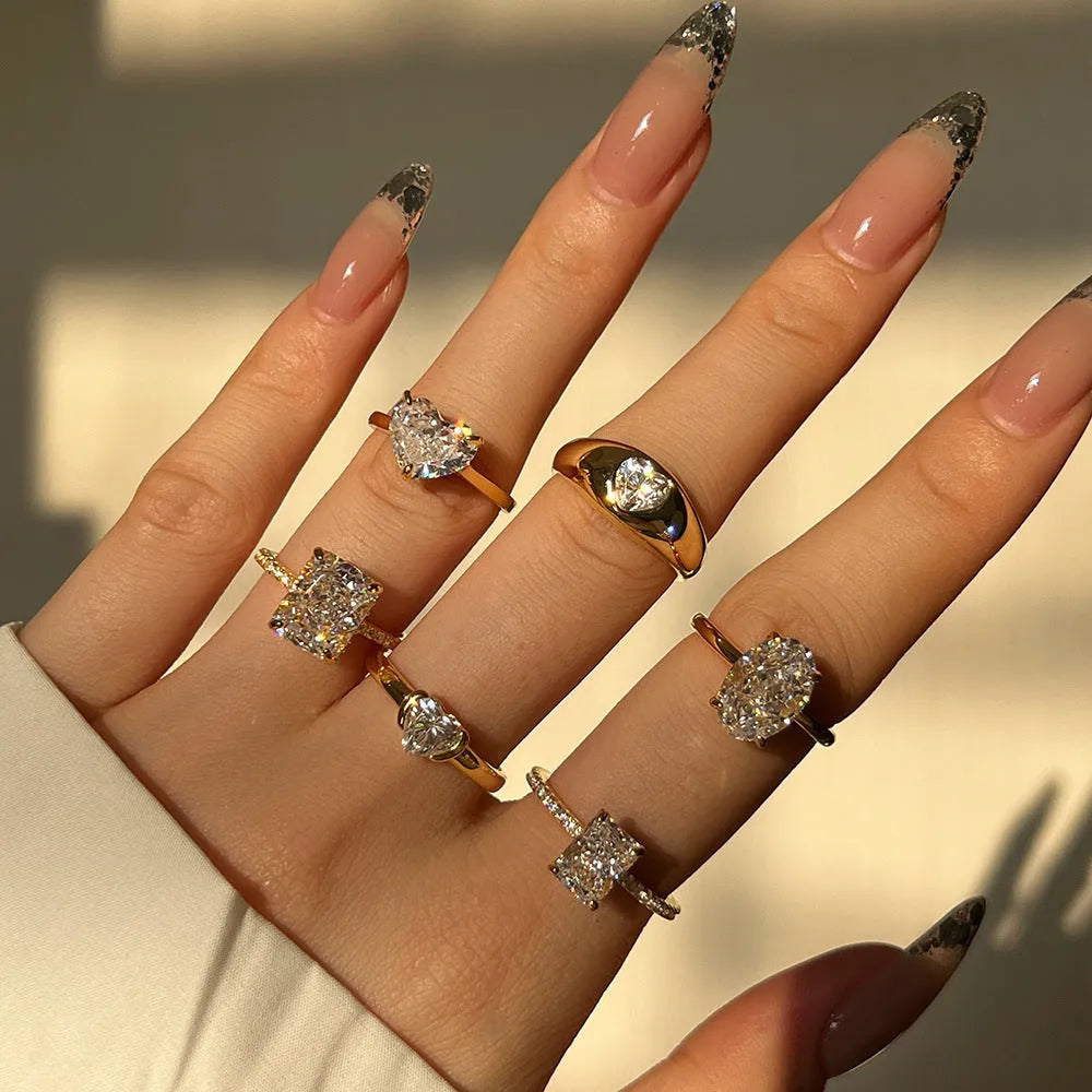 S925 sterling silver ring with golden heart design, women's heart-shaped geometric band, sizes 5 to 9.