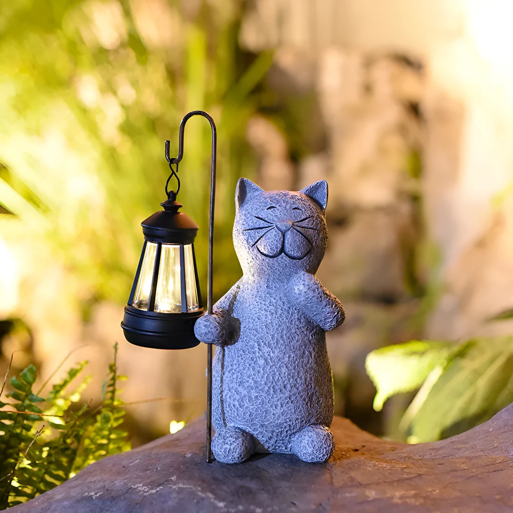 Pastoral style resin solar garden lamp with kitten lifting design for outdoor decoration