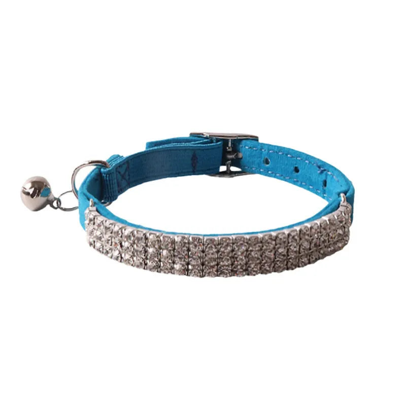 A soft flocking fabric cat collar with a gang drill pattern and an elastic buckle, shown in one of six available colours.