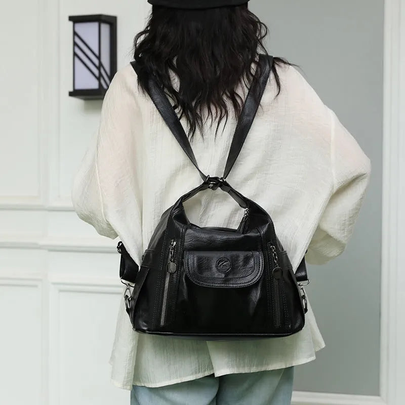 Women's multi-functional shoulder messenger bag in black PU leather with horizontal square shape and sewing line detailing