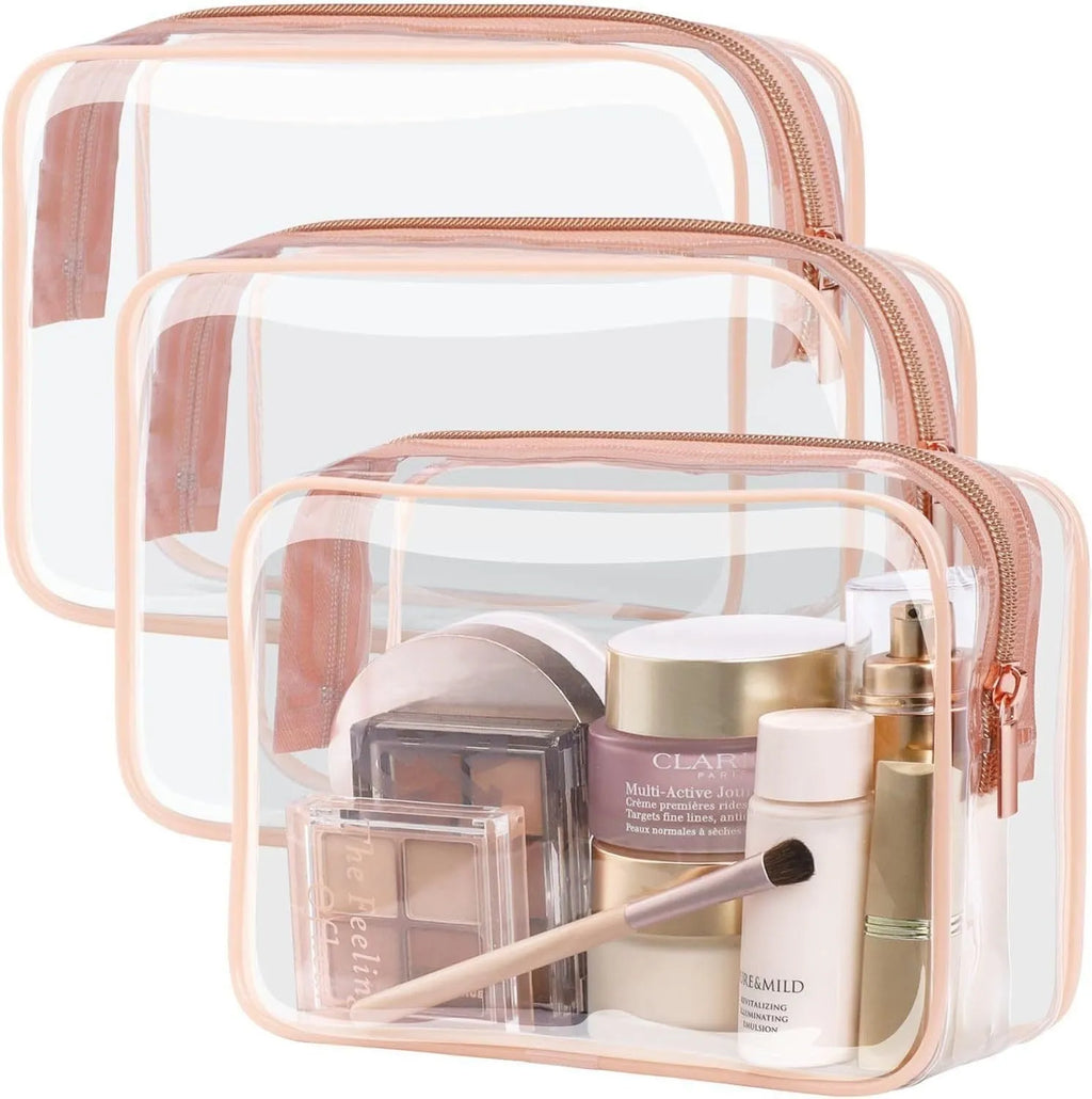 Three semi-transparent PVC makeup bags in black, pink and white colours showing cosmetic storage