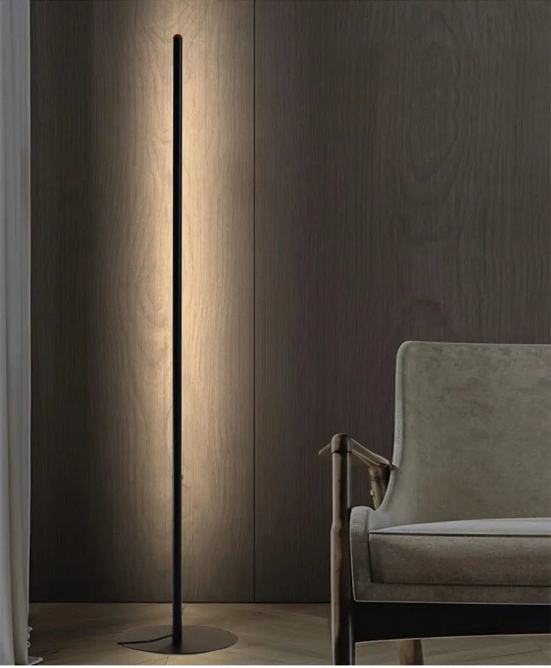 Modern simple vertical aluminium alloy floor lamp in three height sizes on a plain background.