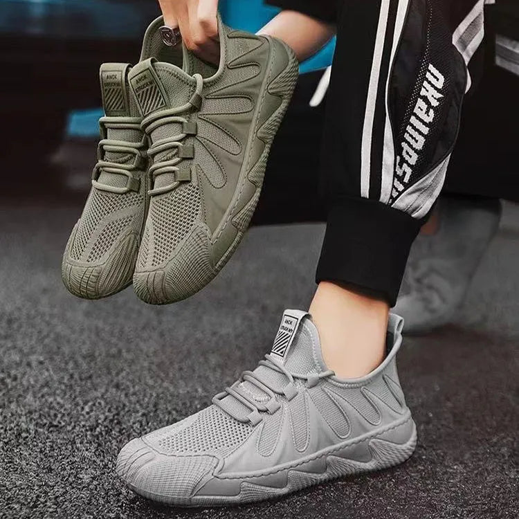 Men's black casual canvas sneakers with lace-up front and breathable mesh panels