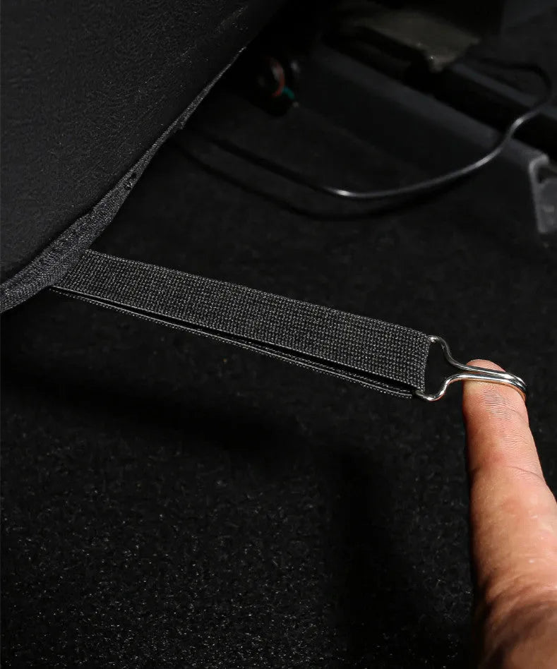 Two black leather rear anti kick pads for car seat back protection.