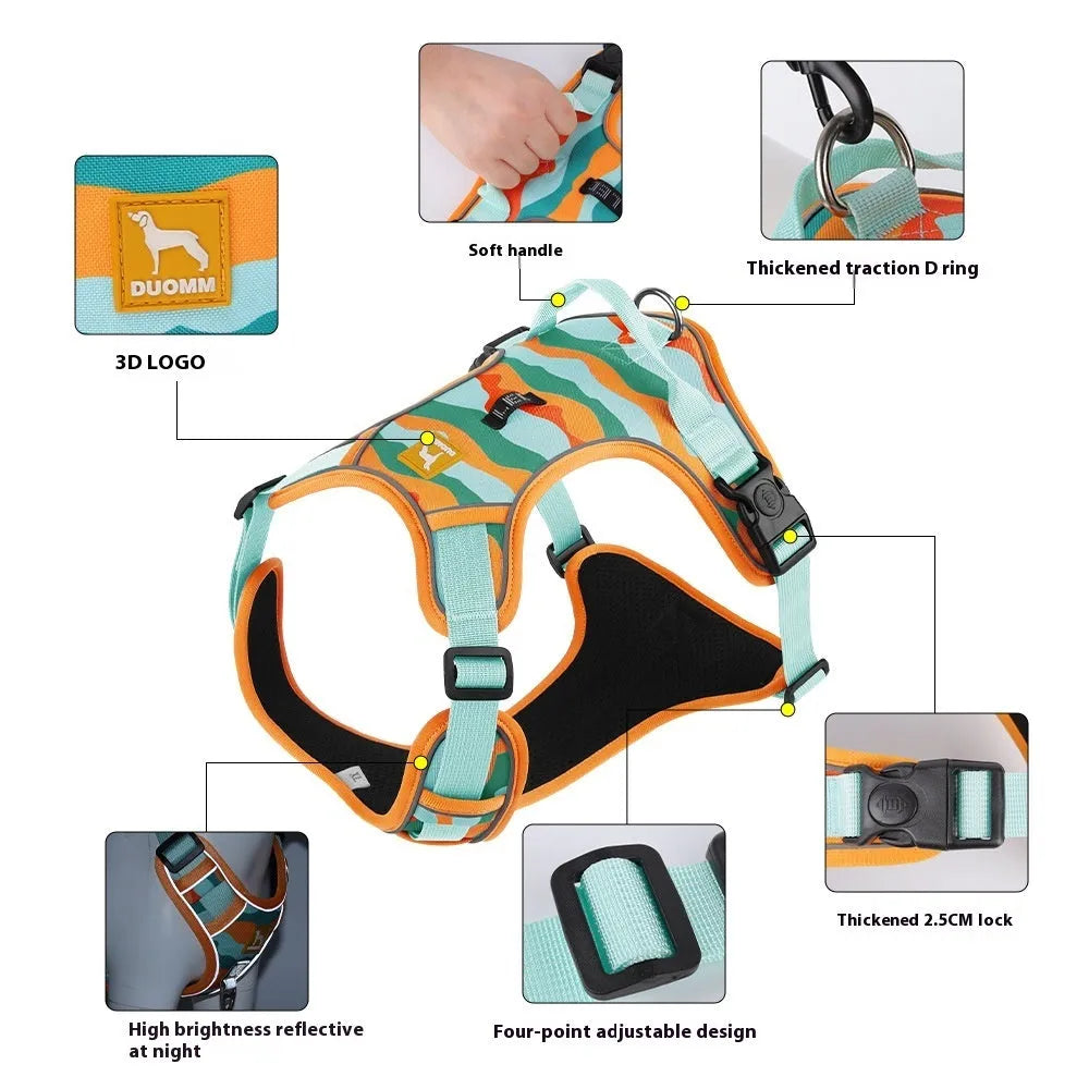 Orange reflective dog harness and hand-hold lead on a grassy background.
