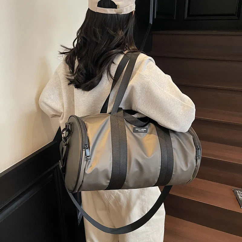 Waterproof Oxford cloth sports handbag in black, dark gold, or dark grey for leisure travel