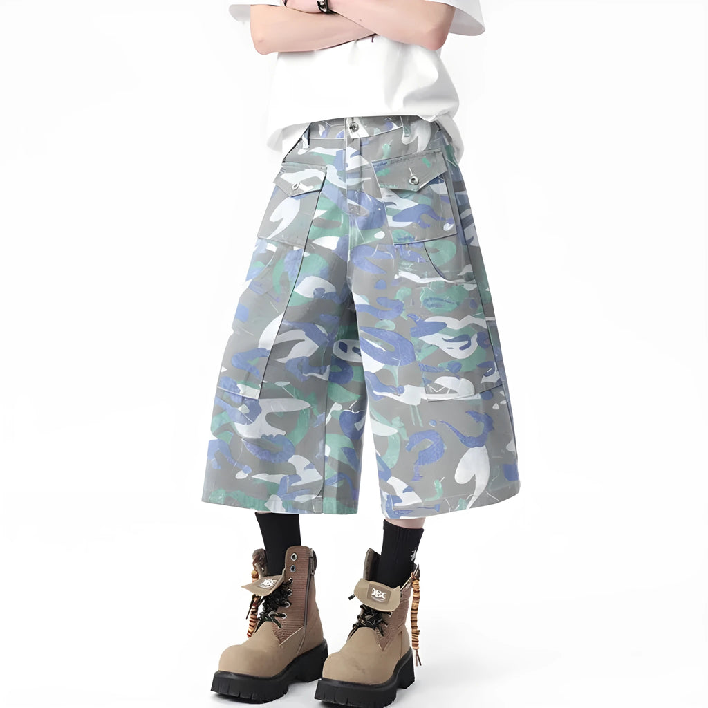 Camouflage pattern cotton cropped workwear trousers with straight leg and pockets on a mannequin