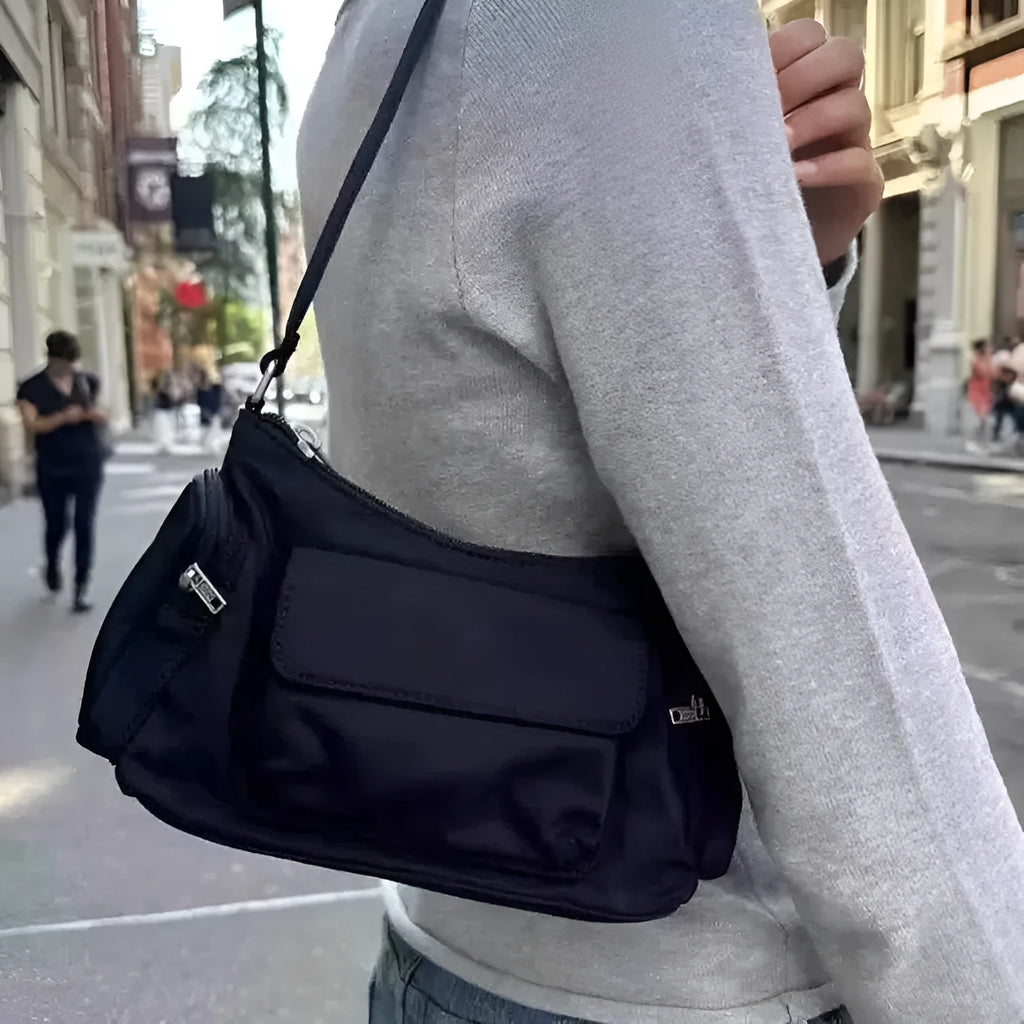 Black PU leather women's shoulder bag with double pockets showing side line design