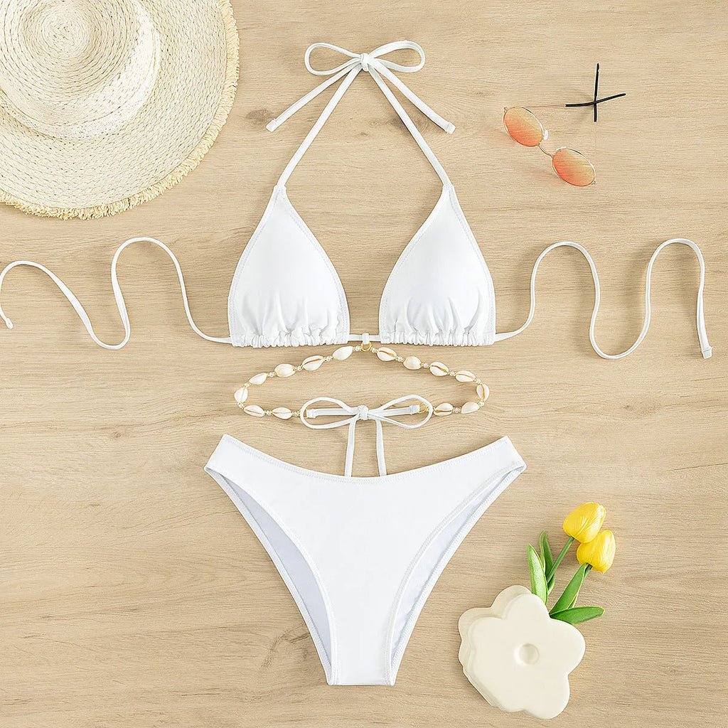 Women's white solid colour halter lace-up swimsuit bikini with briefs bottom.