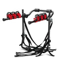 Black and red trunk mounted bike rack with iron frame and sponge padding, showing tie rope and pull belt fastening options.