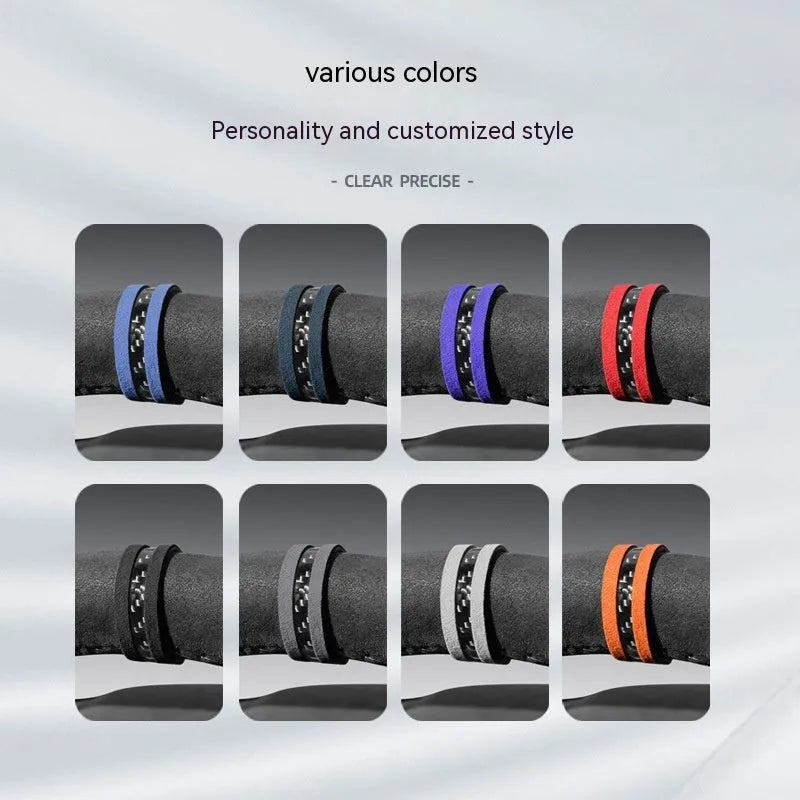 Suede steering wheel cover with carbon fibre back in multiple colour options on a car steering wheel.
