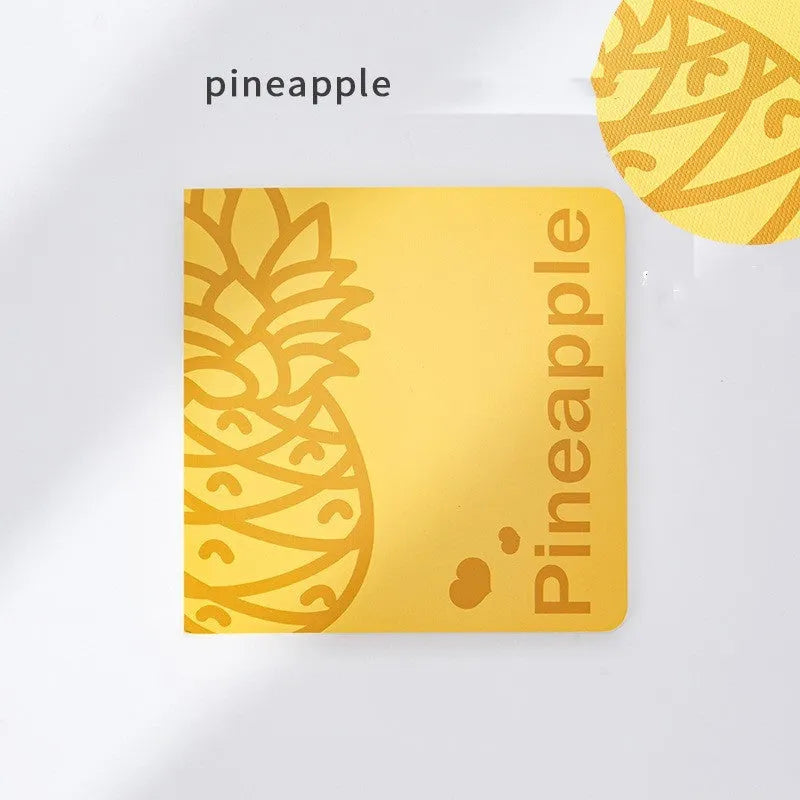 Square notebook with embossed fruit cover design showing 14.5cm dimensions and thickened paper pages