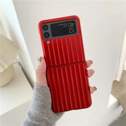 Samsung Z Flip3 folding phone in a slim, solid-colour flip case showing front and back views.