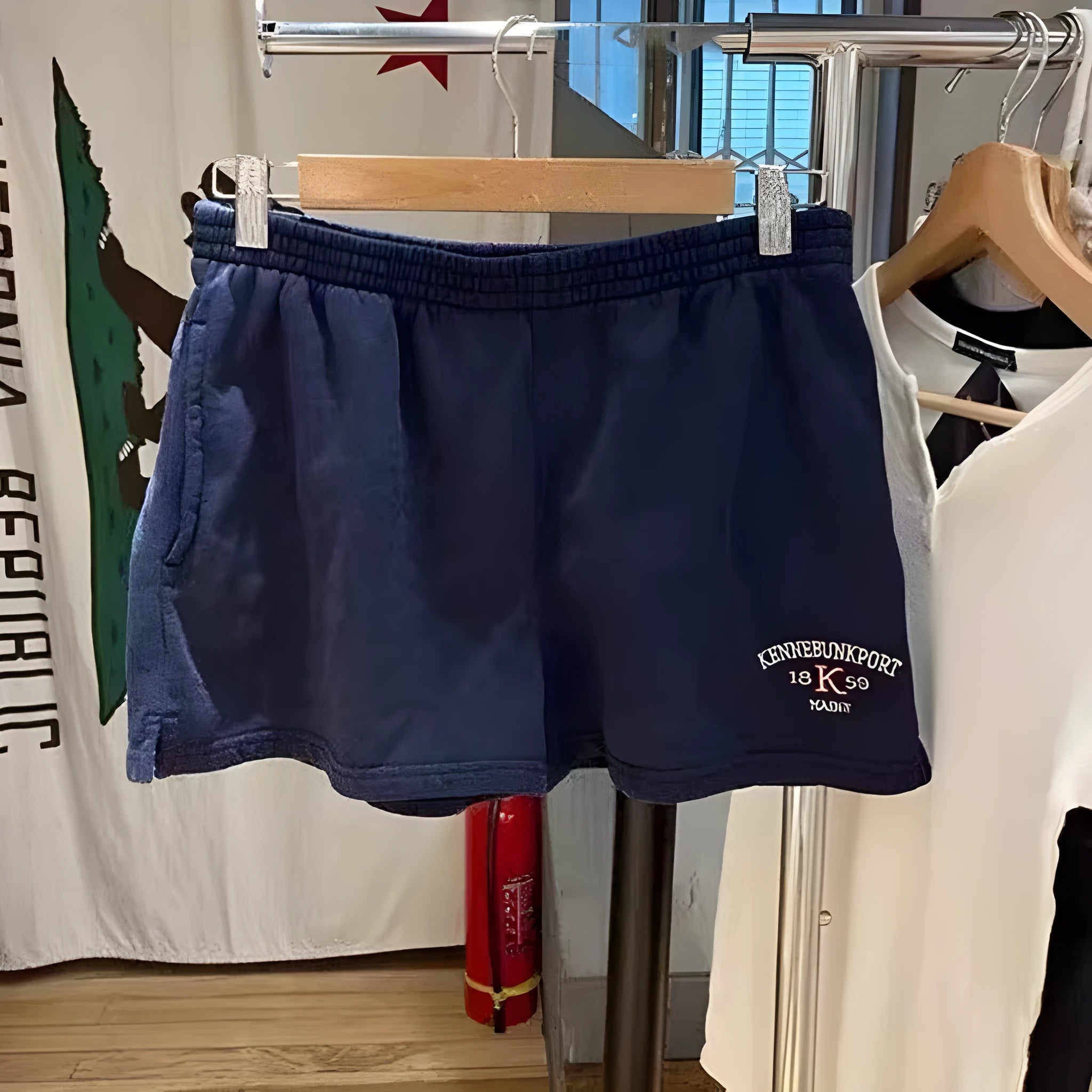 Women's dark blue cotton sports hot shorts with white flag embroidery, high top style
